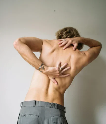 A man suffering from severe sciatica pain.