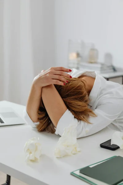 A woman suffering from severe headache.