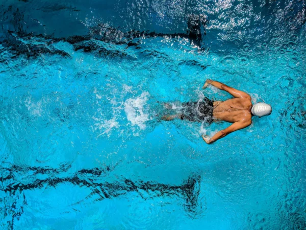 A swimmer swims better with chiropractic treatment.